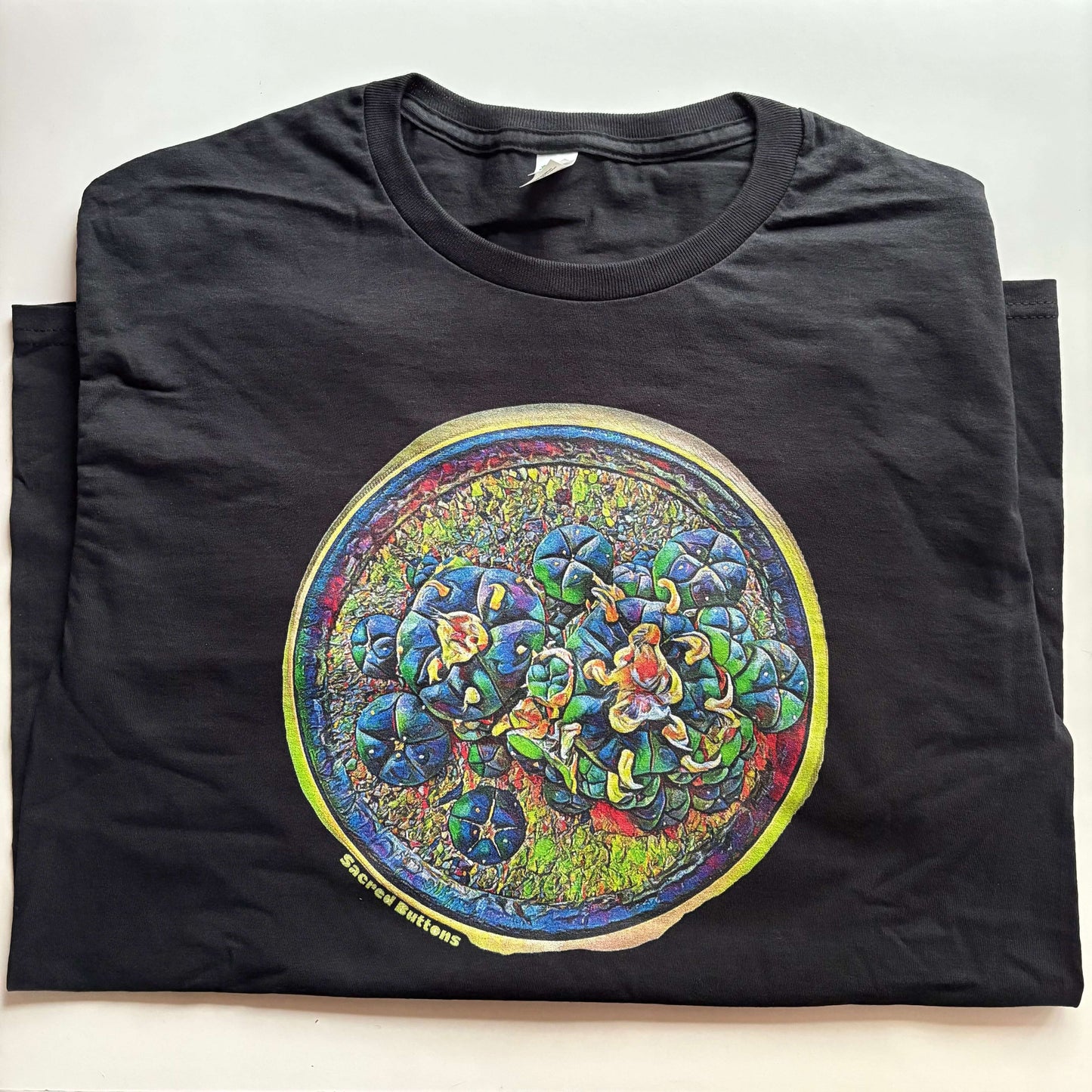 A t-shirt with custom Sacred Buttons artwork.