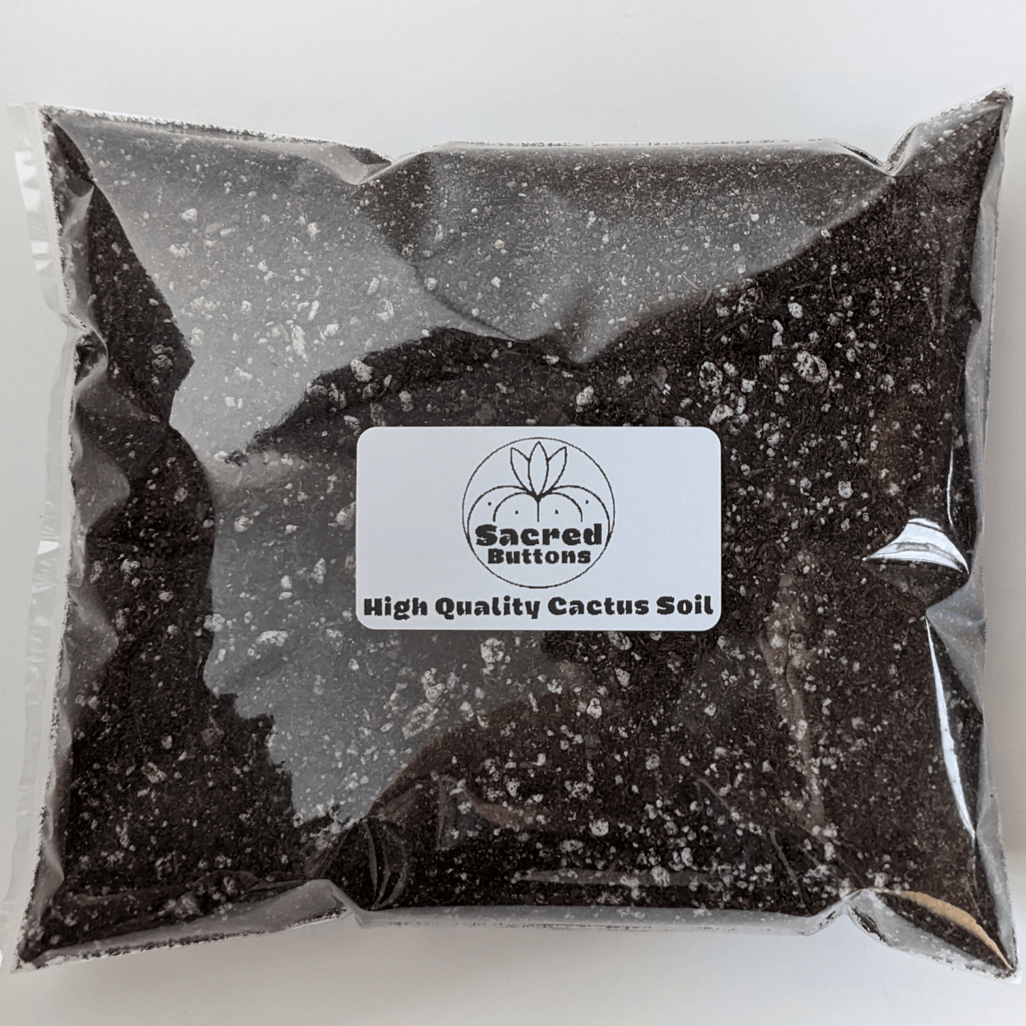 A bag of Sacred Buttons high-quality cactus soil.